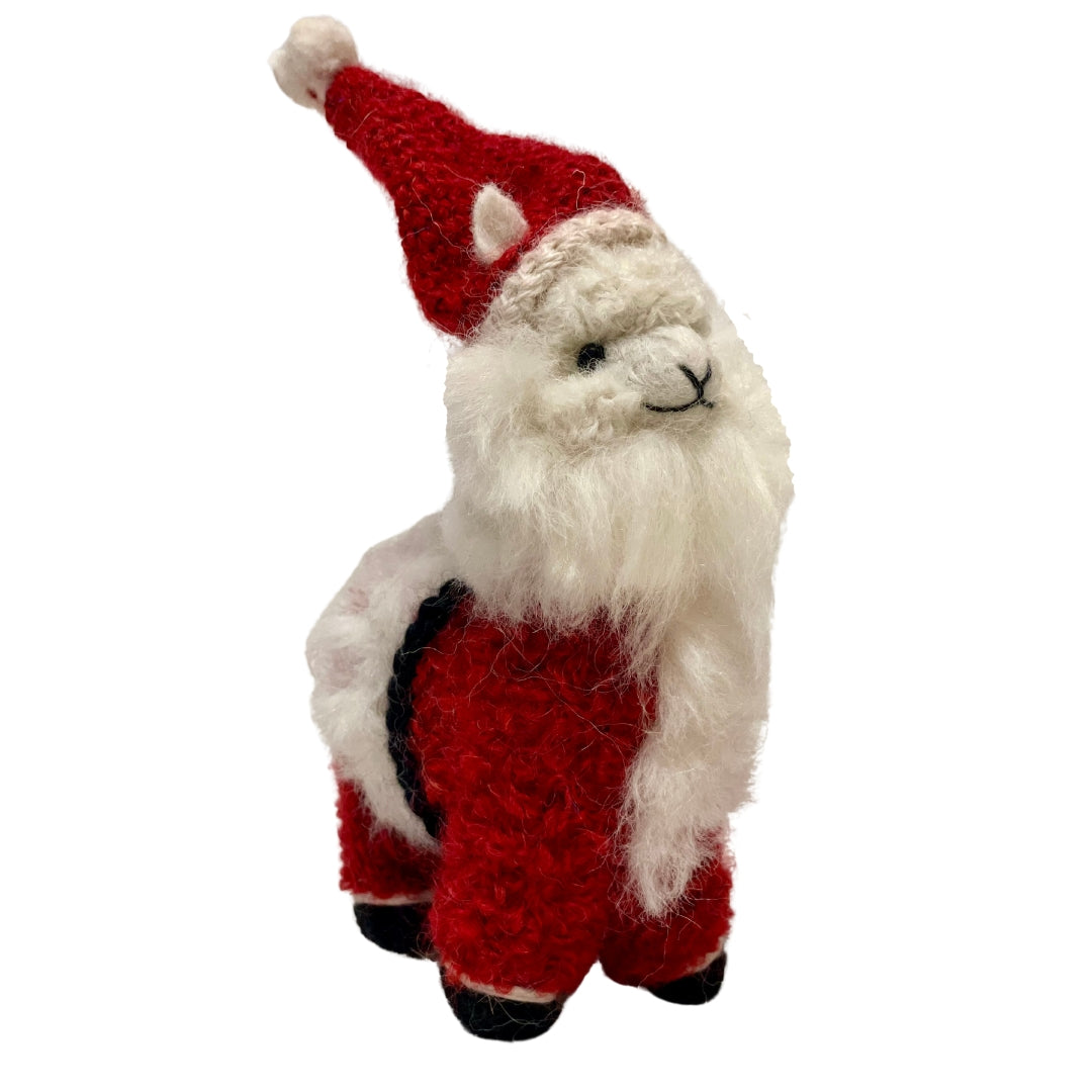 A product photo of a cute soft fluffy handmade toy natural white alpaca with a long white beard, red and white santa hat a red and white santa suit with yellow buttons and a black belt felted woven alpaca wool figurine and ornament for christmas holiday gifts