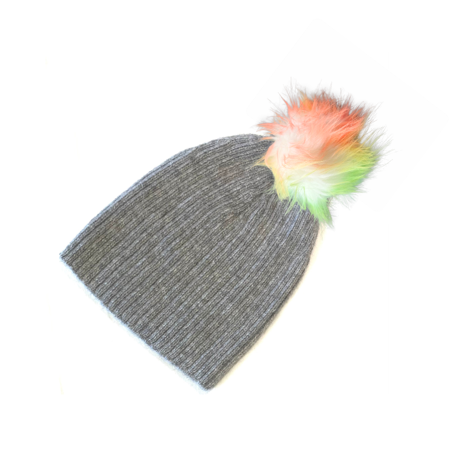 A product photo of a soft warm winter cozy moisture wicking comfortable fashionable light gray alpaca wool beartooth beanie with a white and rainbow pom pom.