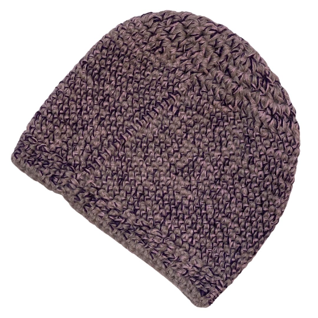 A product photo with a white background of an Alpacas of Montana soft cozy comfortable stylish thermal fashionable moisture wicking antimicrobial knitted crochet mountaineer skullcap beanie hat handmade in Montana from latte brown, blush pink, and bright purple violet alpaca wool and bamboo yarn.