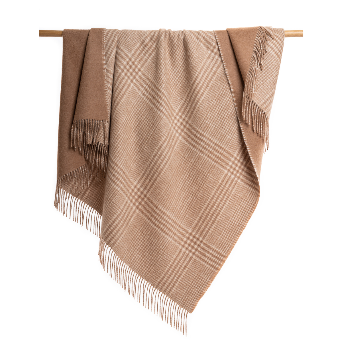 An Alpacas of Montana soft cozy luxury warm roasted chestnut brown plaid blanket with a tasseled edge.
