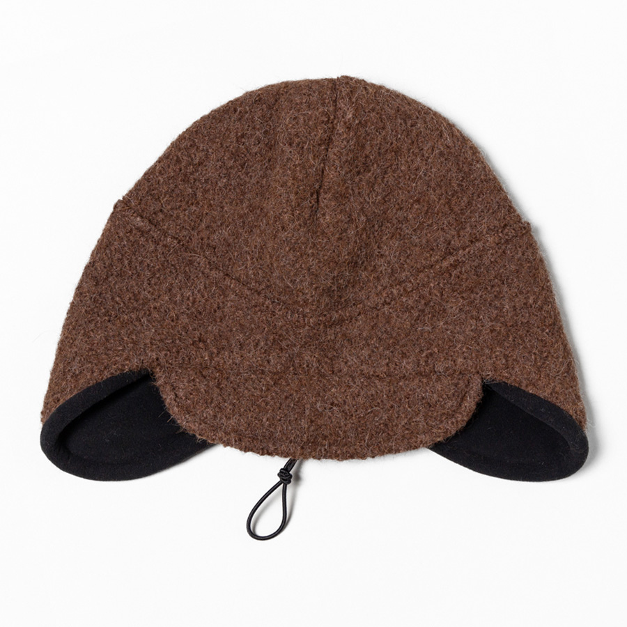 Front view of a brown alpaca Extreme Warmth hat featuring a soft, textured exterior, ear flaps, and a black fleece lining with an adjustable drawcord for a secure fit.
