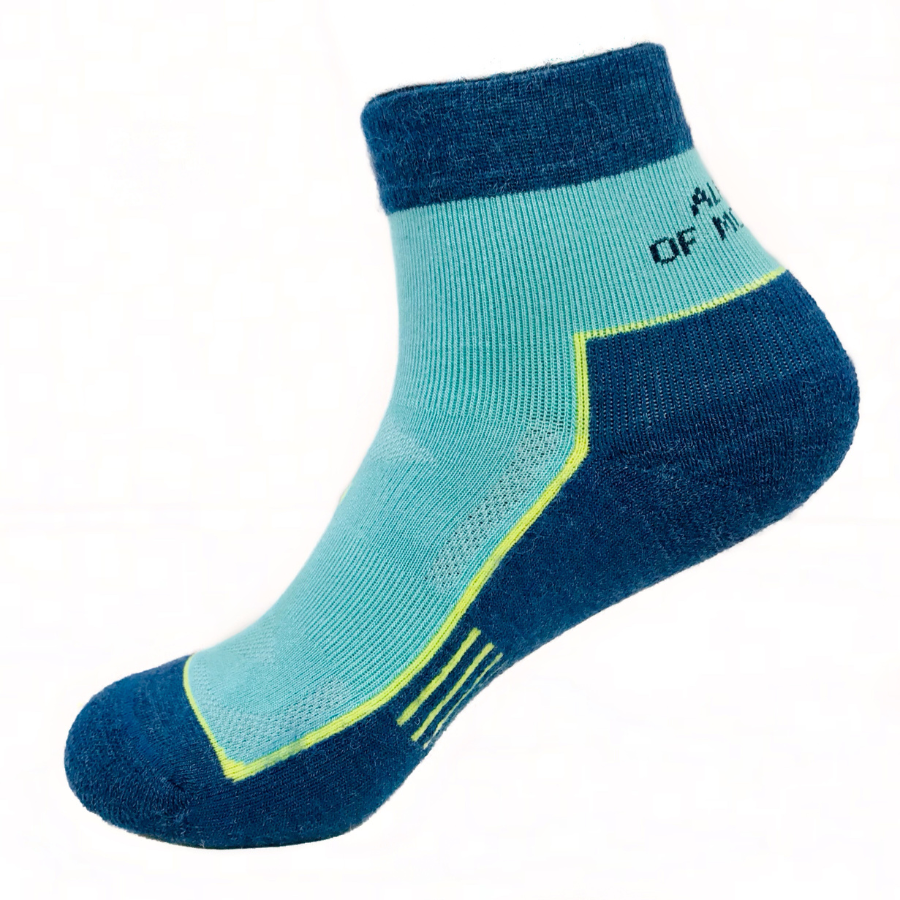 A product photo of teal, lime yellow, and navy blue moisture wicking activewear outdoors athletic quarter ankle hiking socks.