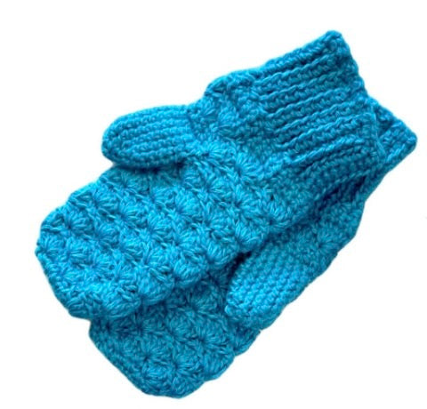 A product photo with a white background of a soft stylish cozy comfortable fashionable moisture wicking knitted crochet scallop pattern mittens handmade in Montana from bright teal blue alpaca wool yarn.