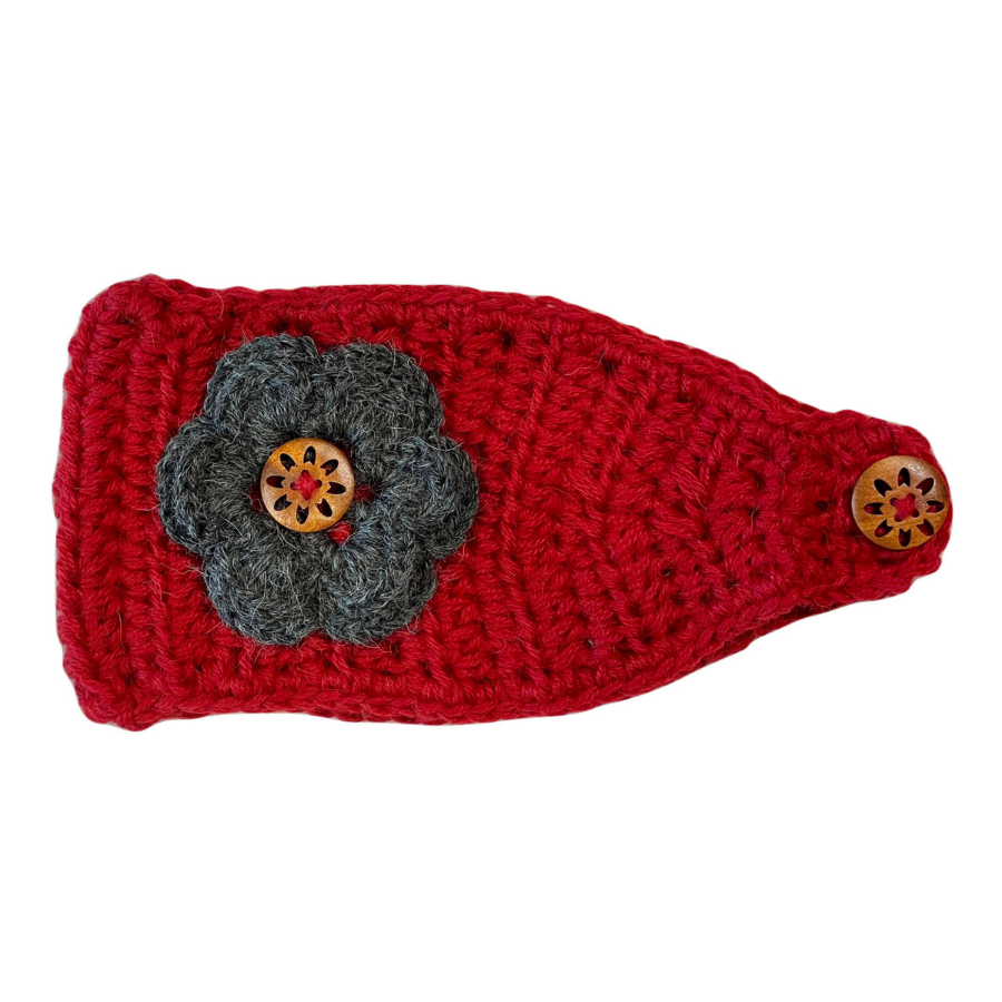 A product photo against a white background of a soft cute stylish fashion cozy comfortable warm winter headband and flower accessory handmade knit crochet in Montana from scarlet red and dark gray alpaca yarn