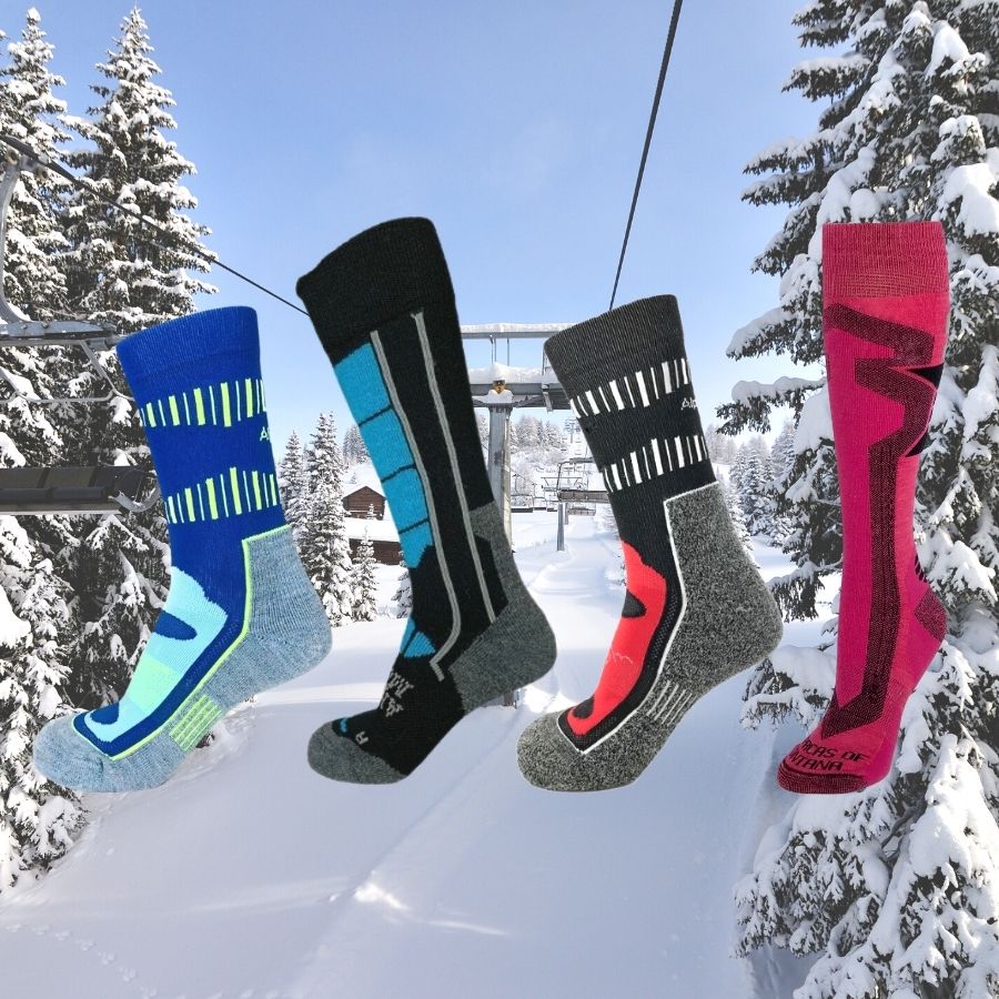 mid crew alpaca wool socks and alpaca wool ski socks in front of winter background