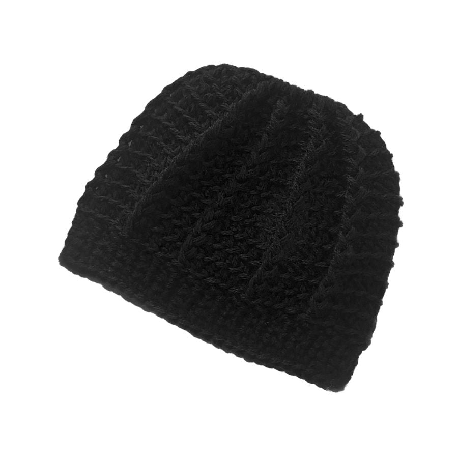 A product photo on a white background of a soft cozy comfortable fashionable moisture wicking knitted crochet ponytail hat handmade in Montana from black alpaca wool and bamboo yarn.