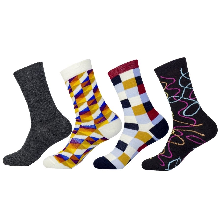 A product photo of the Alpacas of Montana medium gray dress sock, colorful patterned Swag Socks, checkered colorful Own It socks, and black squiggly colorful Night Life Socks.