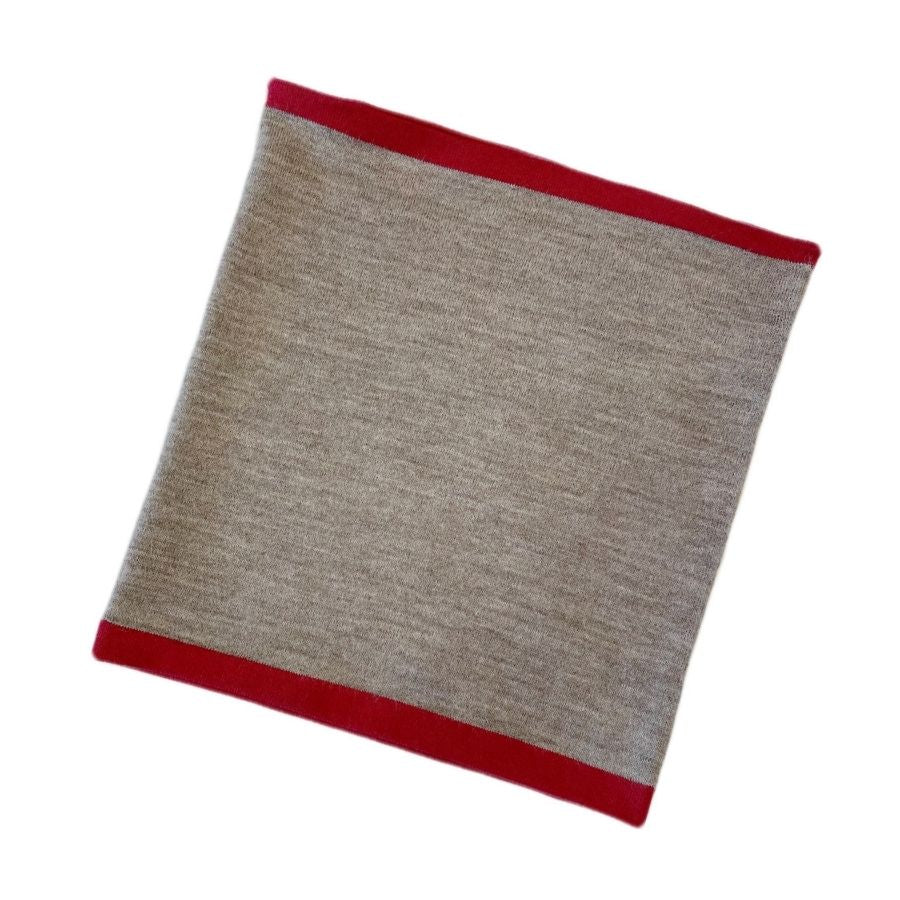 A product photo against a white background of a lightweight cozy comfortable moisture wicking warm breathable all seasons thin thermal outerwear skiing hiking climbing outdoors hunting fishing high desert neck gaiter made from scarlet red and light camel brown alpaca.