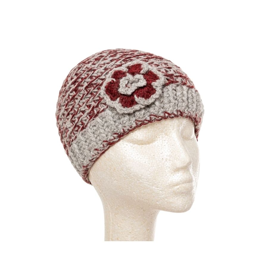 gray and maroon hand knit alpaca beanie hat with flower on mannequin head