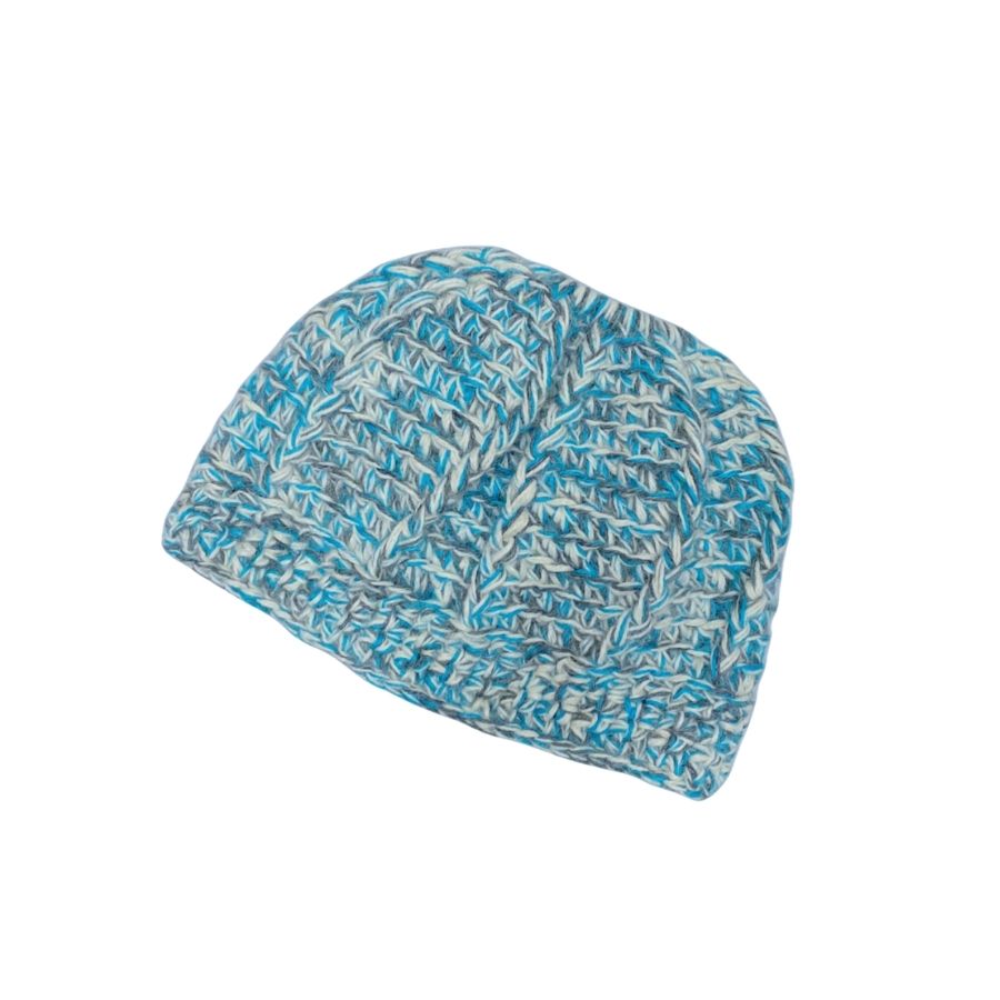 A product photo with a white background of a soft cozy comfortable fashionable moisture wicking knitted crochet ponytail hat handmade in Montana from natural white, bright teal turquoise blue, and multi-gray alpaca wool and bamboo yarn.