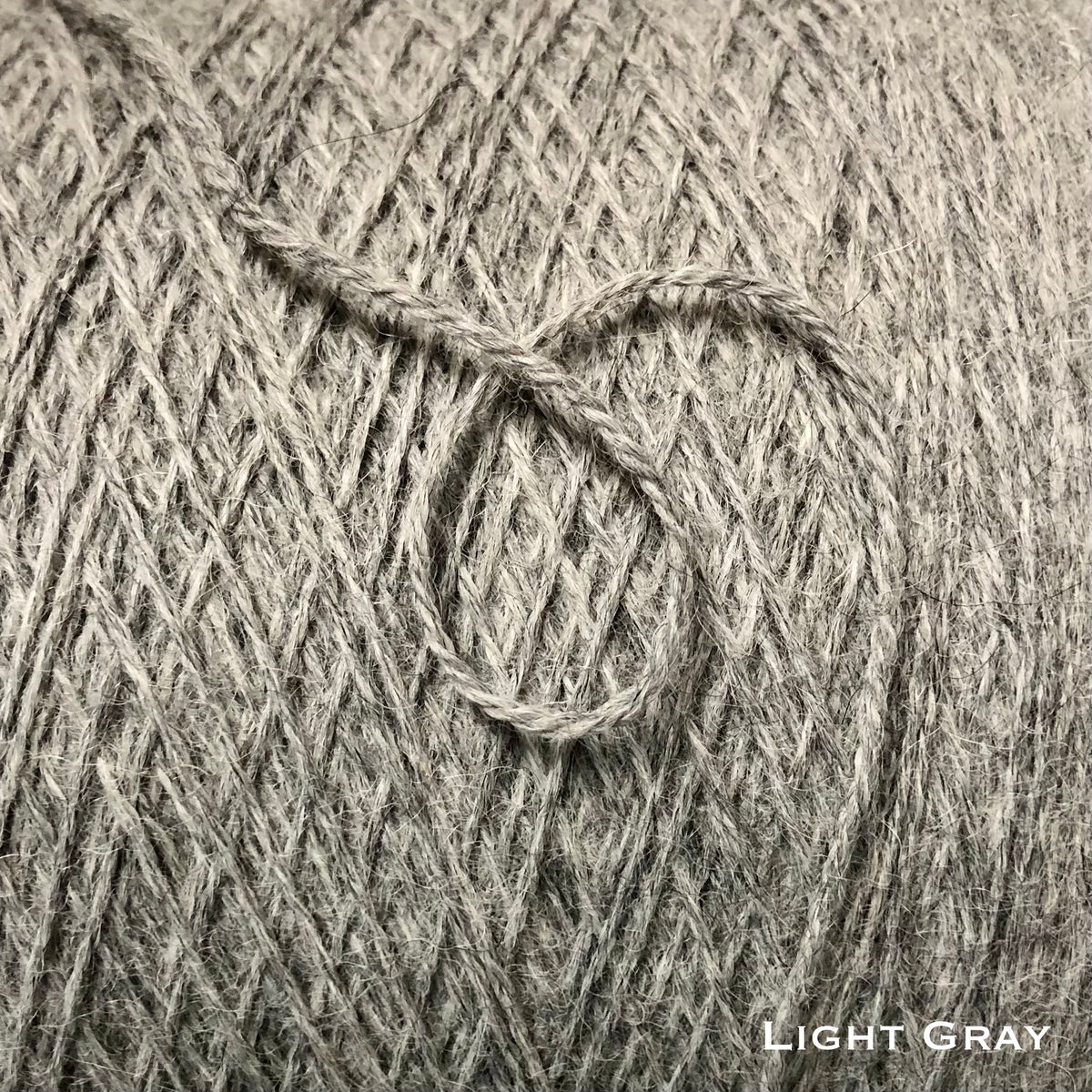 light gray sport weight alpaca wool yarn for knitting and crochet