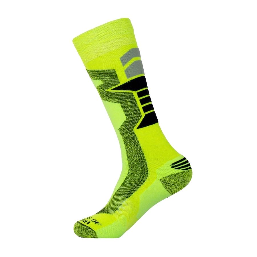 A product photo with a white background of a bright lime green yellow and black Alpacas of Montana cozy comfortable soft warm thermal winter freezing temperatures antimicrobial moisture wicking alpaca wool ski and snowboard socks for snowshoeing, skiing, snowboarding, ice fishing, outdoors.