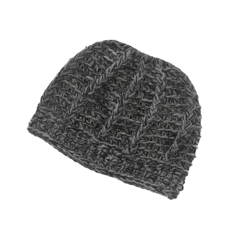 A product photo on a white background of a soft cozy comfortable fashionable moisture wicking knitted crochet ponytail hat handmade in Montana from multi-gray charcoal alpaca wool and bamboo yarn.