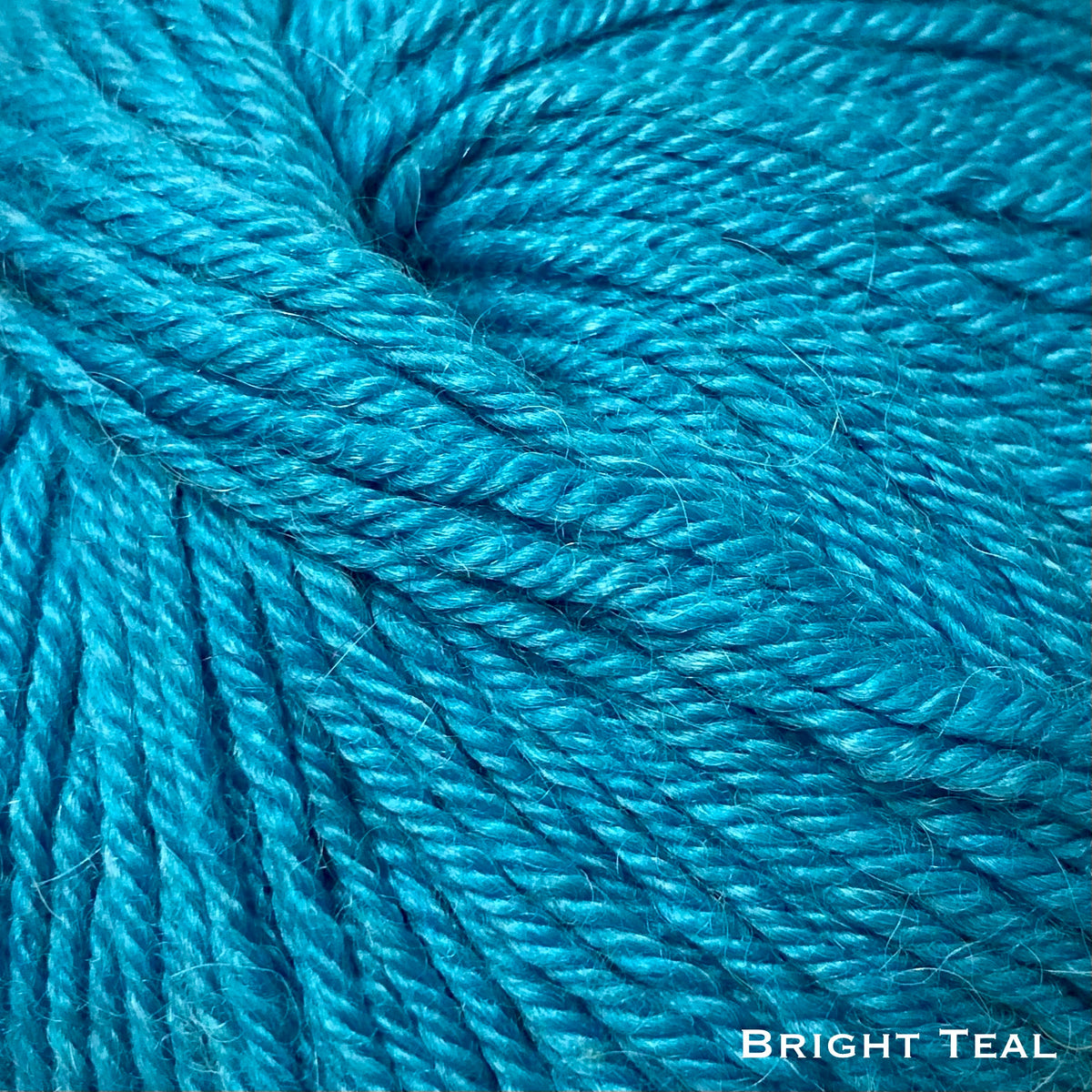 bright teal sport weight alpaca wool yarn for knitting and crochet