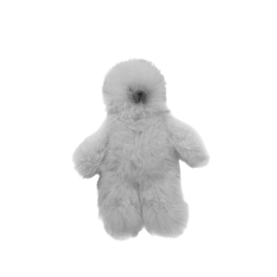 A product photo with a white background of an Alpacas of Montana soft fluffy cozy cute adorable toy silky snowy natural white luxury royal alpaca teddy bear plushie figurine for gifts birthdays christmas children present