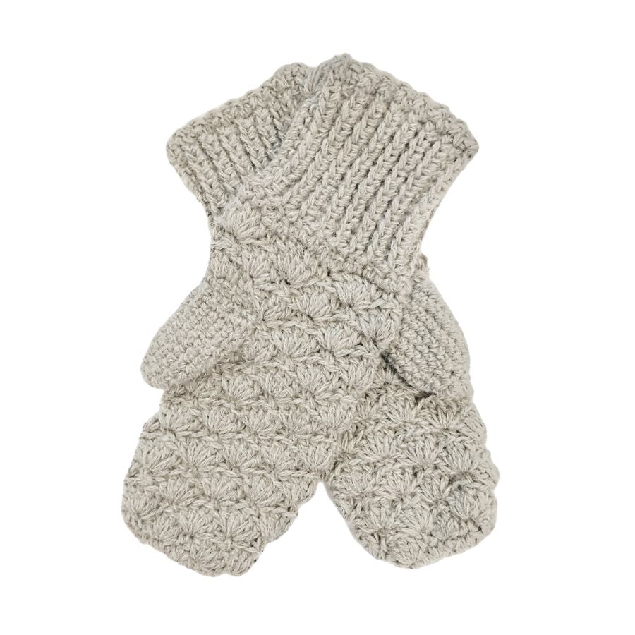 A product photo with a white background of a soft stylish cozy comfortable fashionable moisture wicking knitted crochet scallop pattern mittens handmade in Montana from natural white alpaca wool yarn.