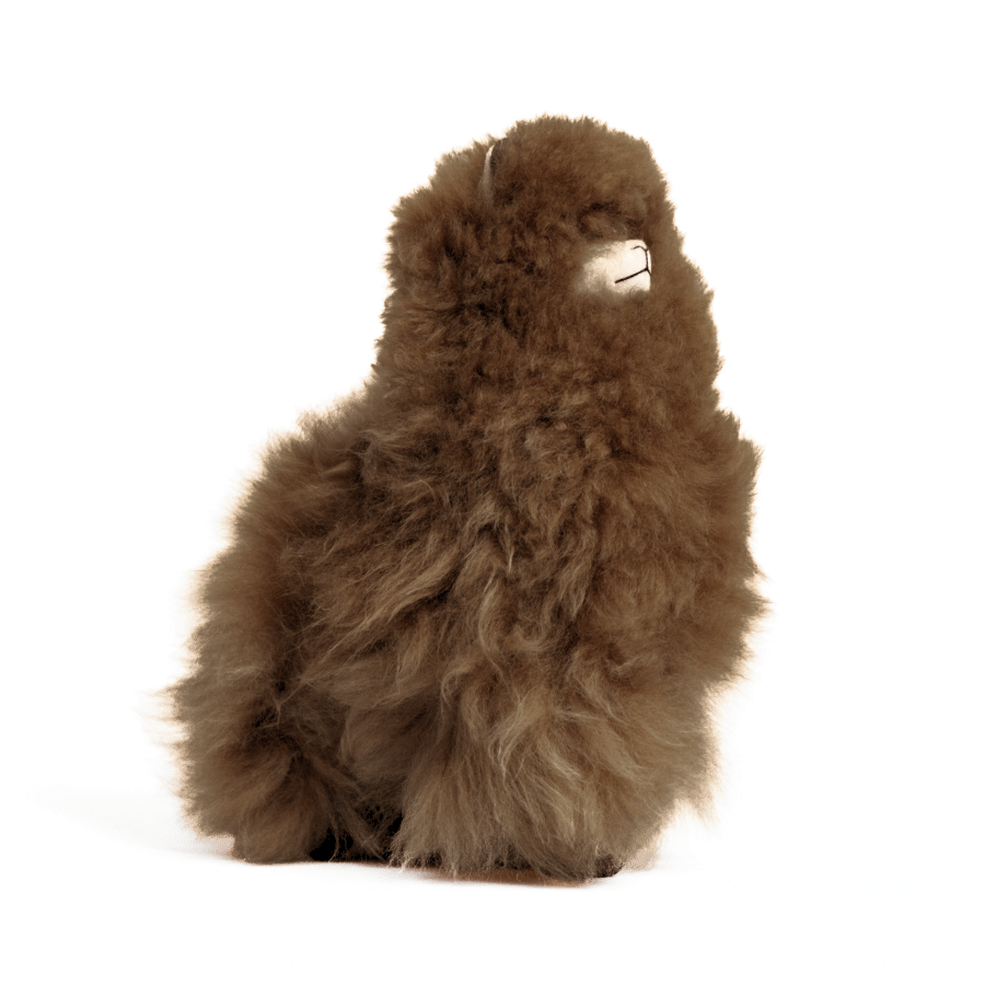 Brown plush toy resembling an alpaca on a white background