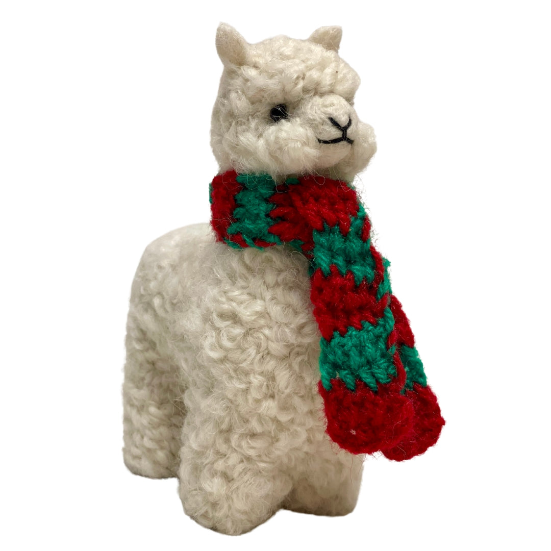 White alpaca with red and green knit scarf ornament
