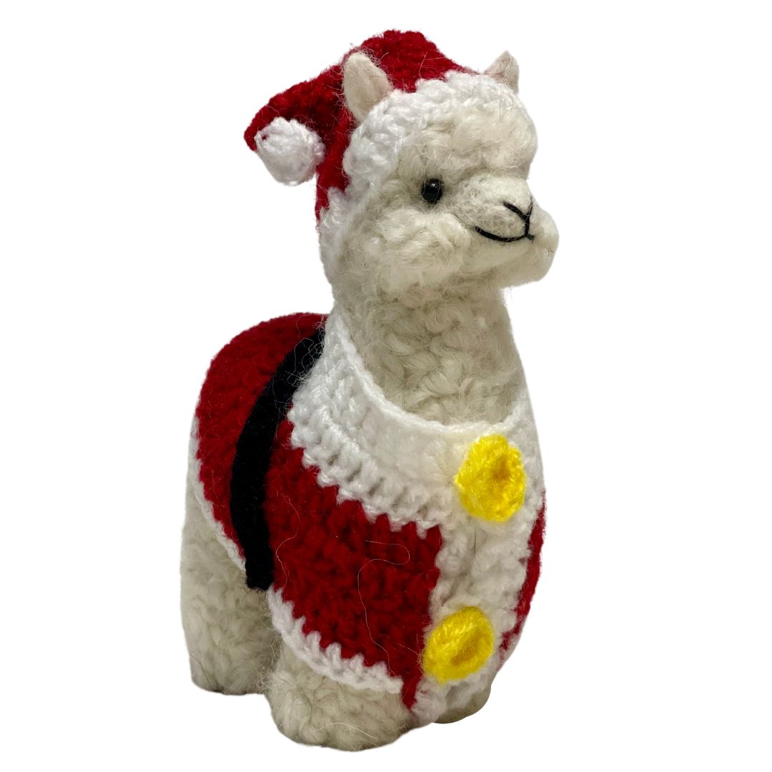 A product photo of a cute soft fluffy handmade toy natural white alpaca with a red and white santa hat a red and white santa suit with yellow buttons and a black belt felted woven alpaca wool figurine and ornament for christmas holiday gifts