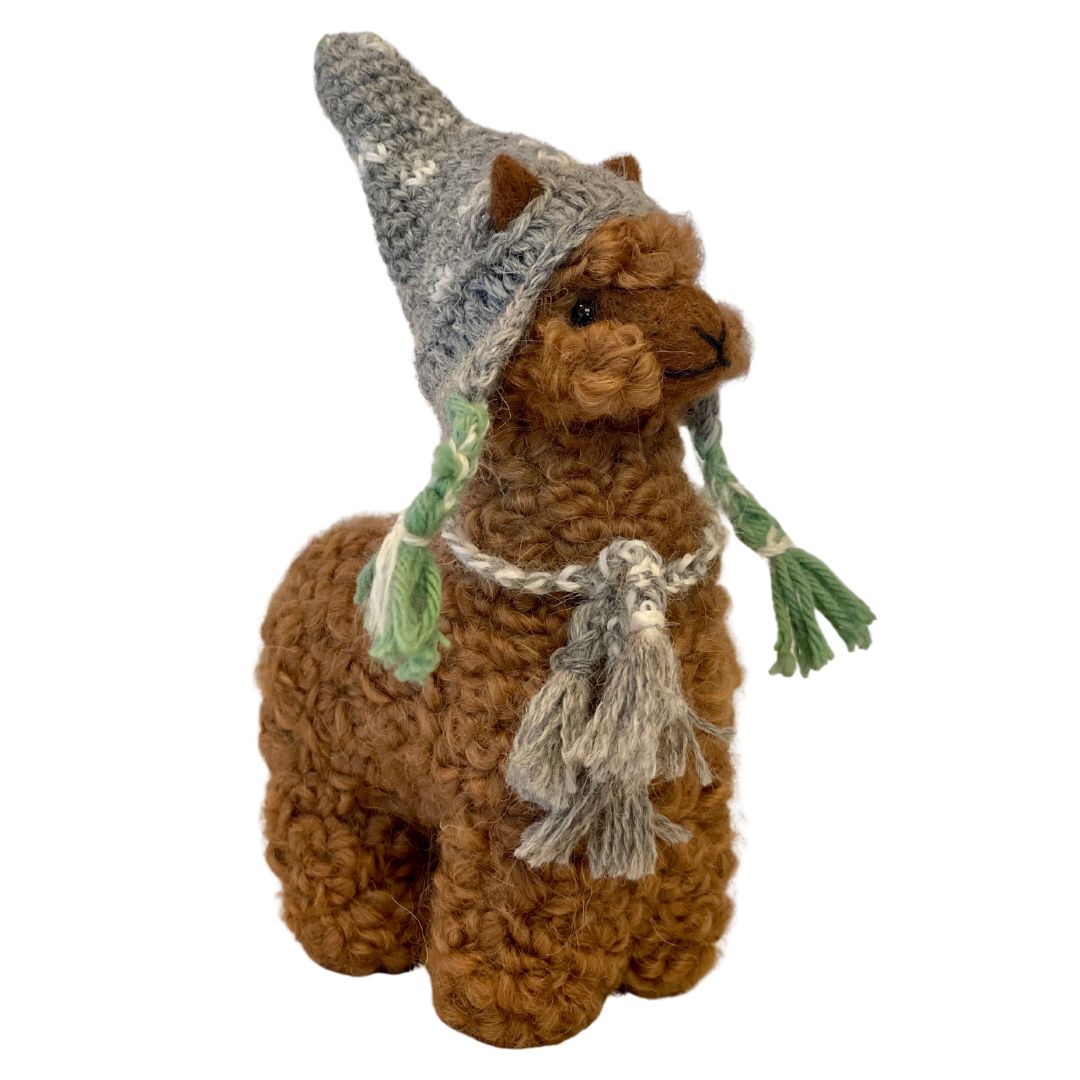 brown alpaca ornament wearing a peruvian chullo hat