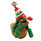 Small plush toy with a knitted hat and scarf on a white background