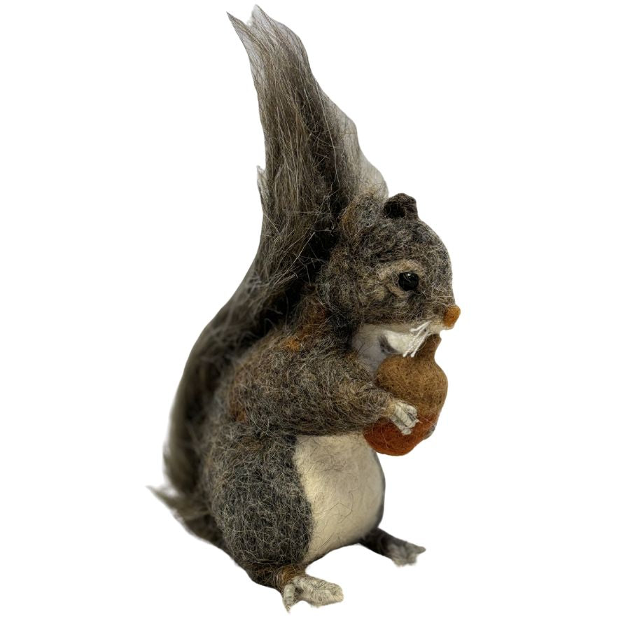 Realistic handmade felted gray squirrel ornament made from alpaca wool with upright tail and acorn detail
