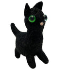 4-inch handmade black cat ornament made from felted alpaca wool with oversized green eyes and upright ears