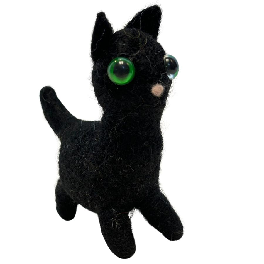 4-inch handmade black cat ornament made from felted alpaca wool with oversized green eyes and upright ears