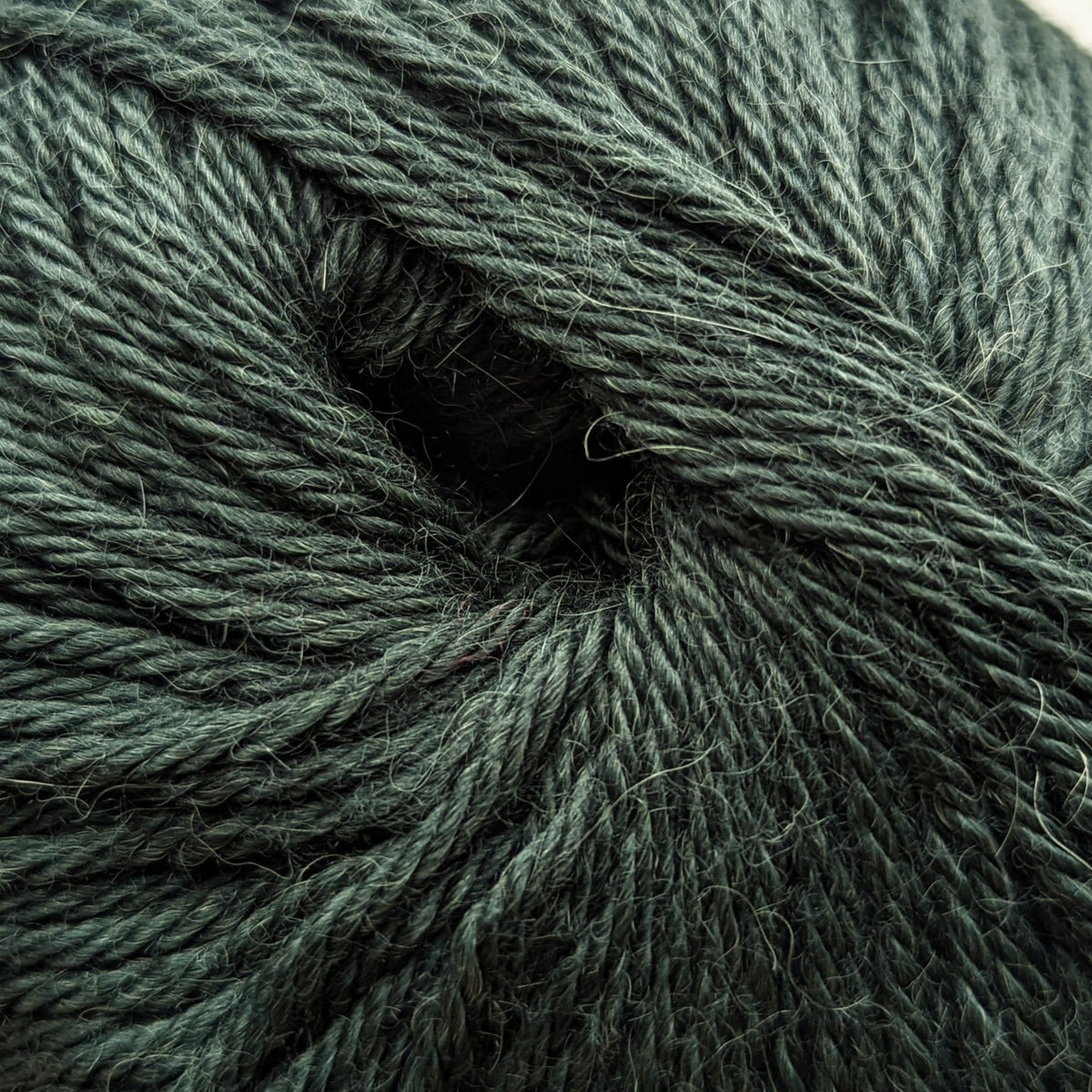 dark forest natural green sport weight alpaca wool yarn for knitting and crochet