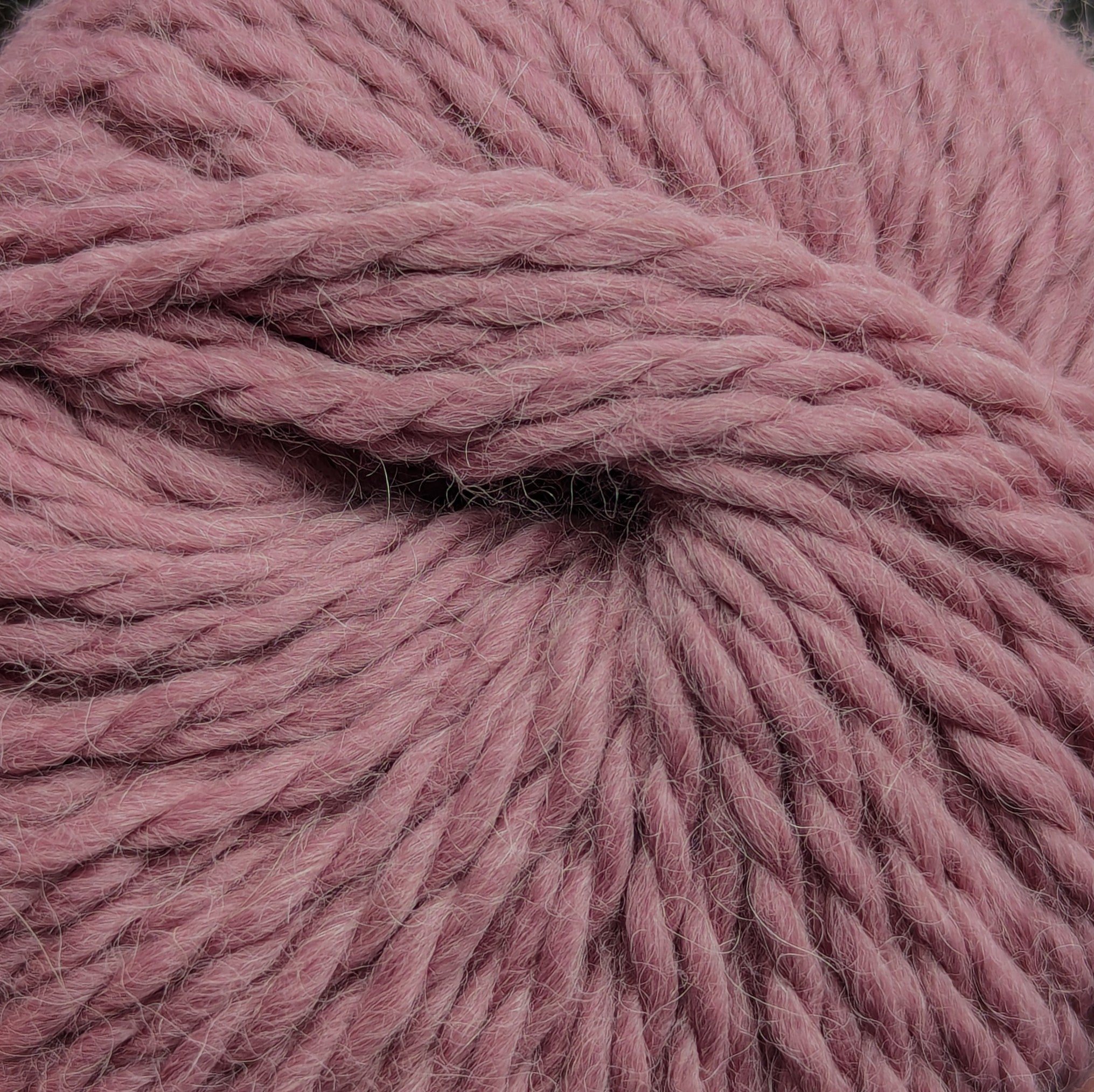 Soft dusty rose pink bulky alpaca wool yarn for knitting and crochet