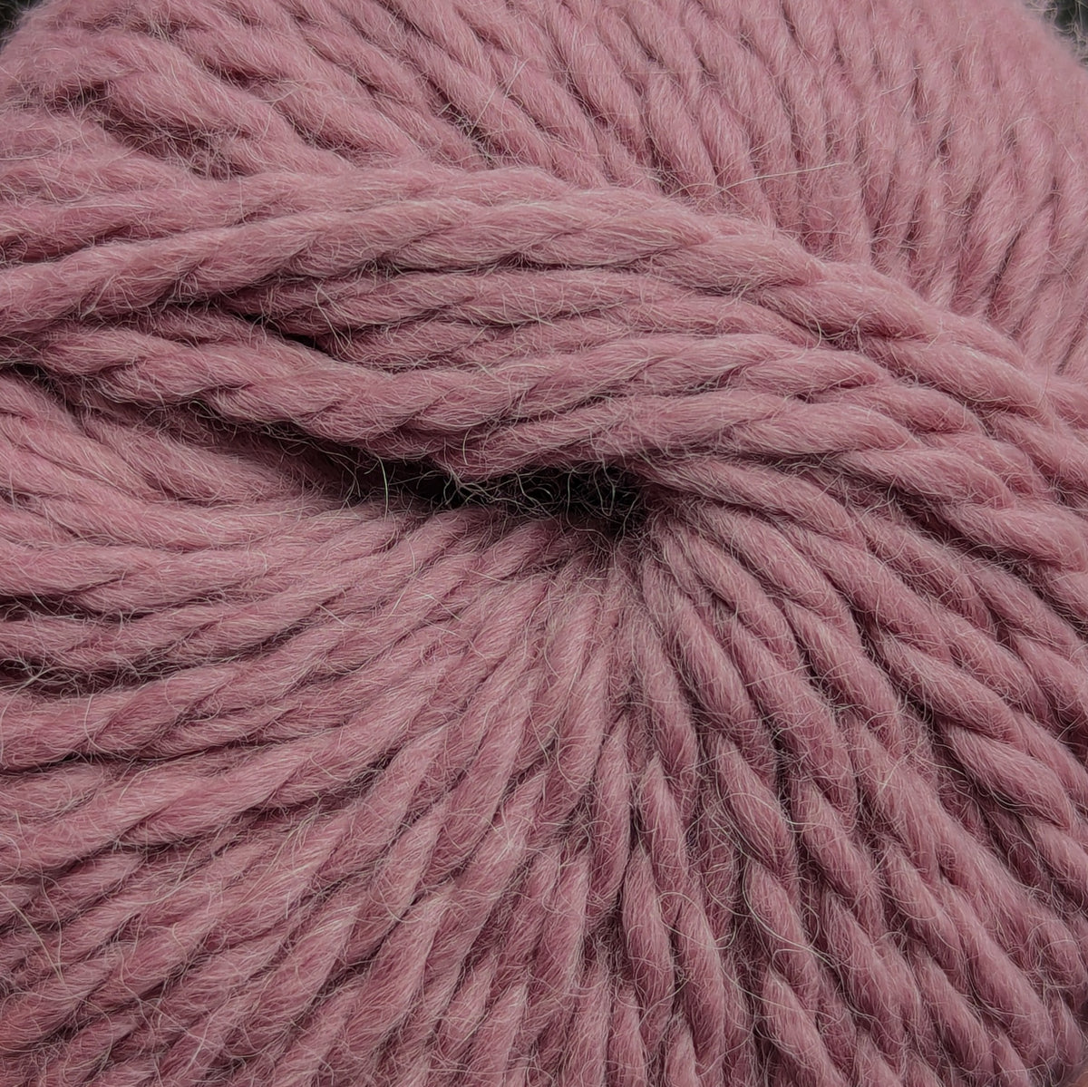 Soft dusty rose pink bulky alpaca wool yarn for knitting and crochet