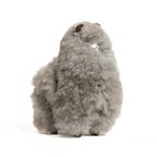 A plush toy made from gray alpaca fleece that is 9" inches tall
