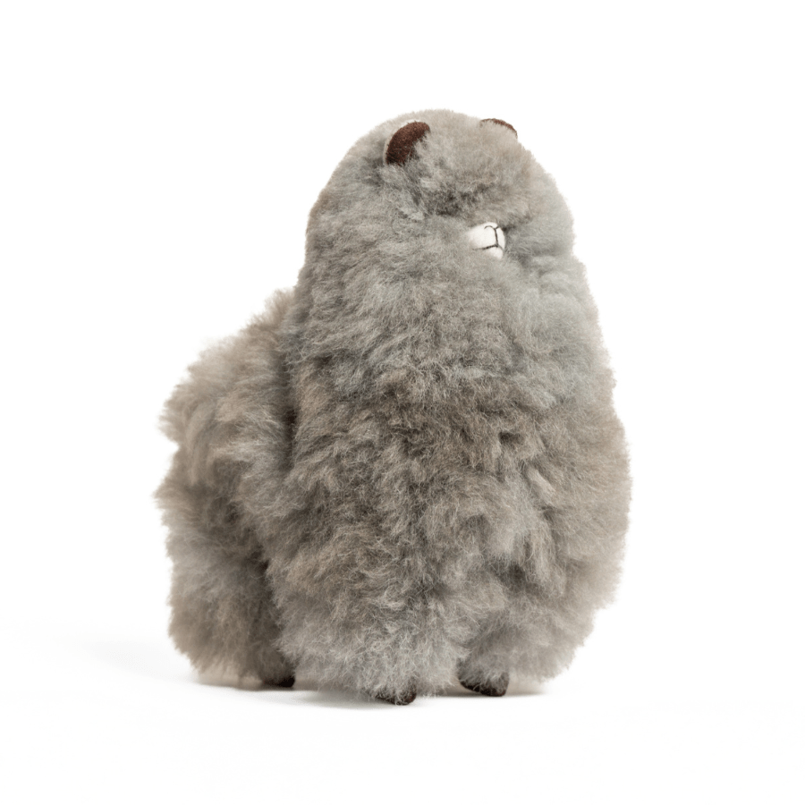 A plush toy made from gray alpaca fleece that is 9" inches tall
