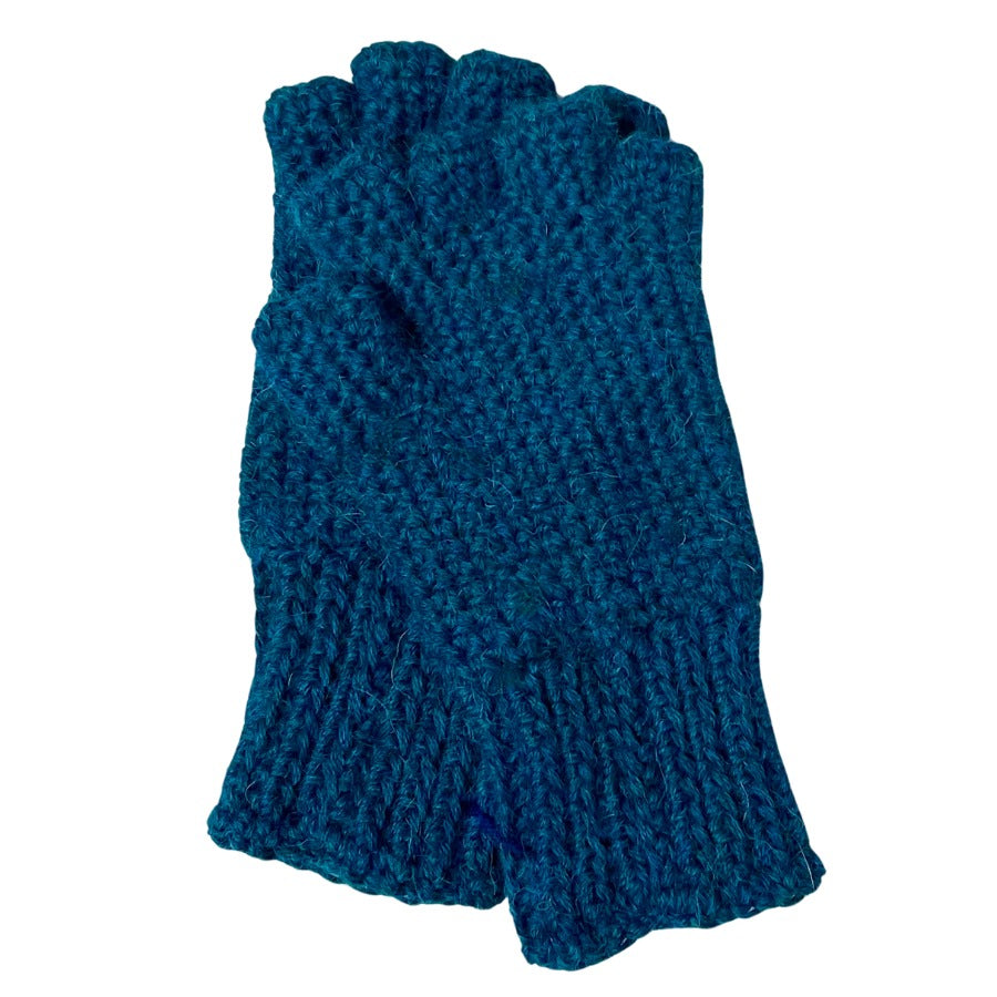 A product photo with a white background of a hand wearing a soft cozy comfortable fashionable moisture wicking knitted crochet fingerless gloves handmade in Montana from ocean blue alpaca wool yarn.