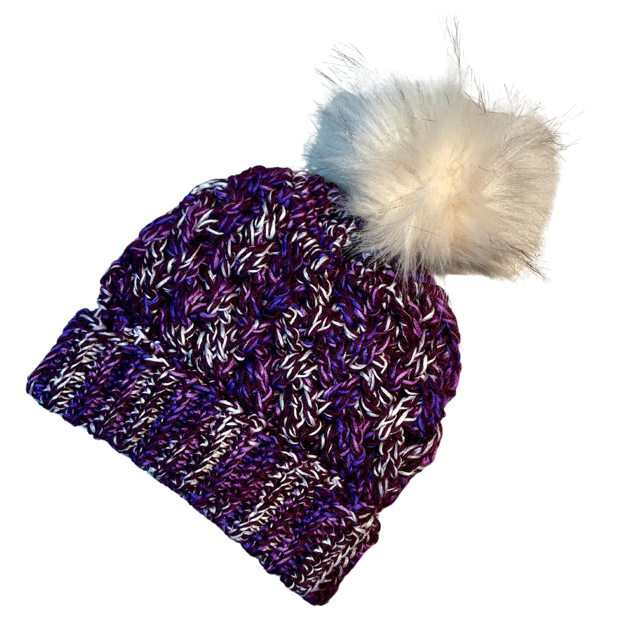 Deep purple, bright purple violet, and white colored cozy soft warm handmade knitted crochet celtic hat with a white pom pom made in Montana by Alpacas of Montana.