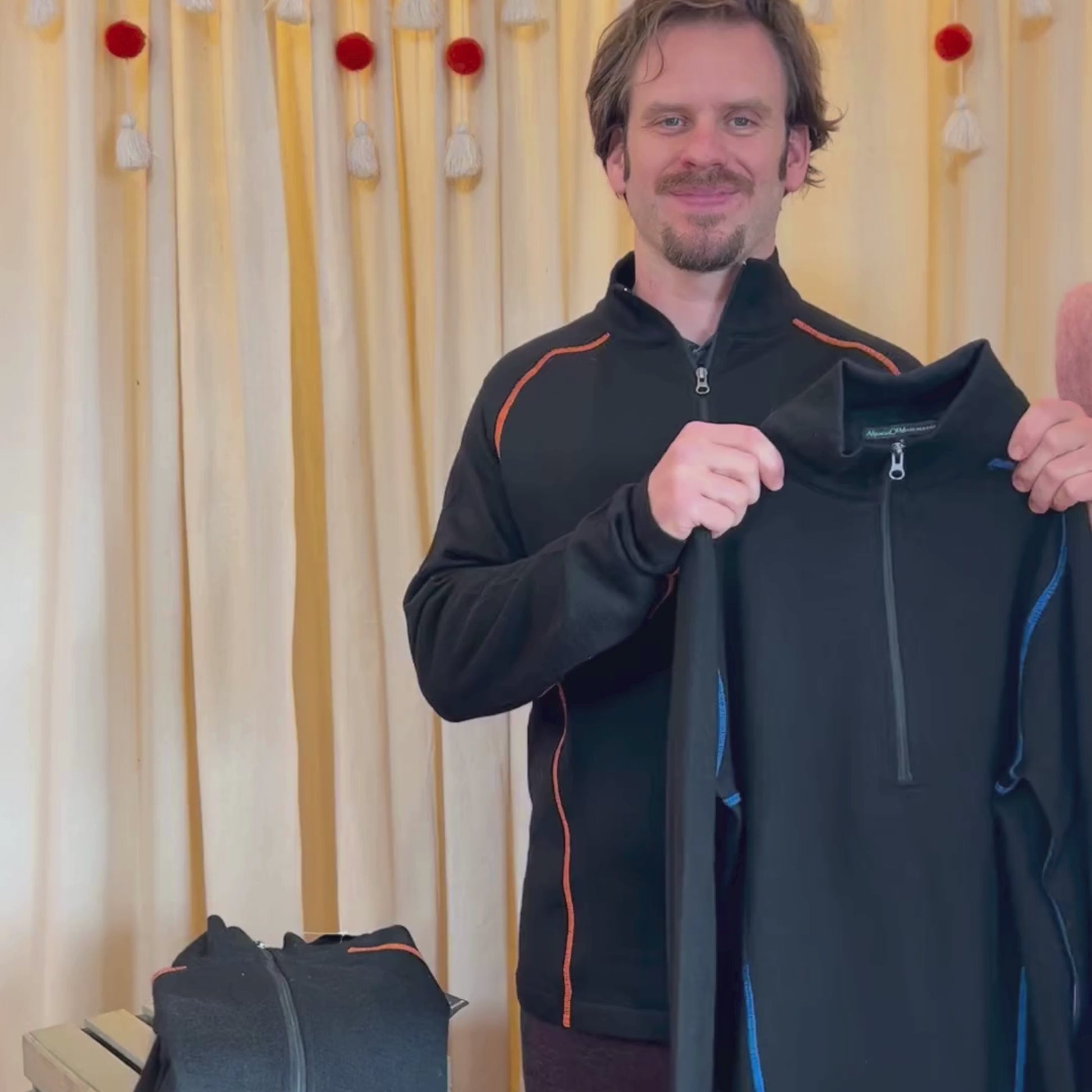 An informative video about the Alpacas of Montana men's mid-layer quarter zip long sleeve top