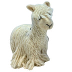 Handmade 4-inch white Suri alpaca wool ornament with soft yarn-like texture and string for hanging on tree or display