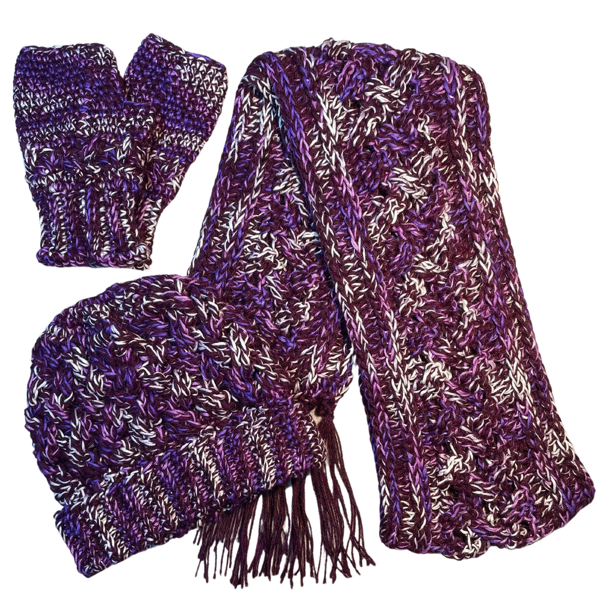 Cozy soft warm alpaca and bamboo matching set of ridge ribbed hat, scarf with long tassels, and ridge ribbed mittens for winter fashion. Handmade knitted crochet items made from yarn in the colors deep purple, bright purple violet, and white