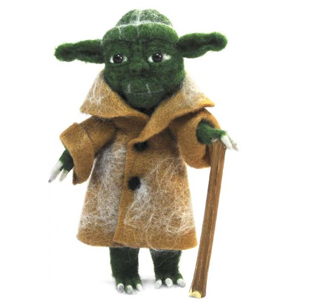 A product photo with a white background of a cute silly funny star wars space sci-fi green, white, and tan yoda with a wooden stick felted alpaca wool figurine and ornament for gifts birthday holiday