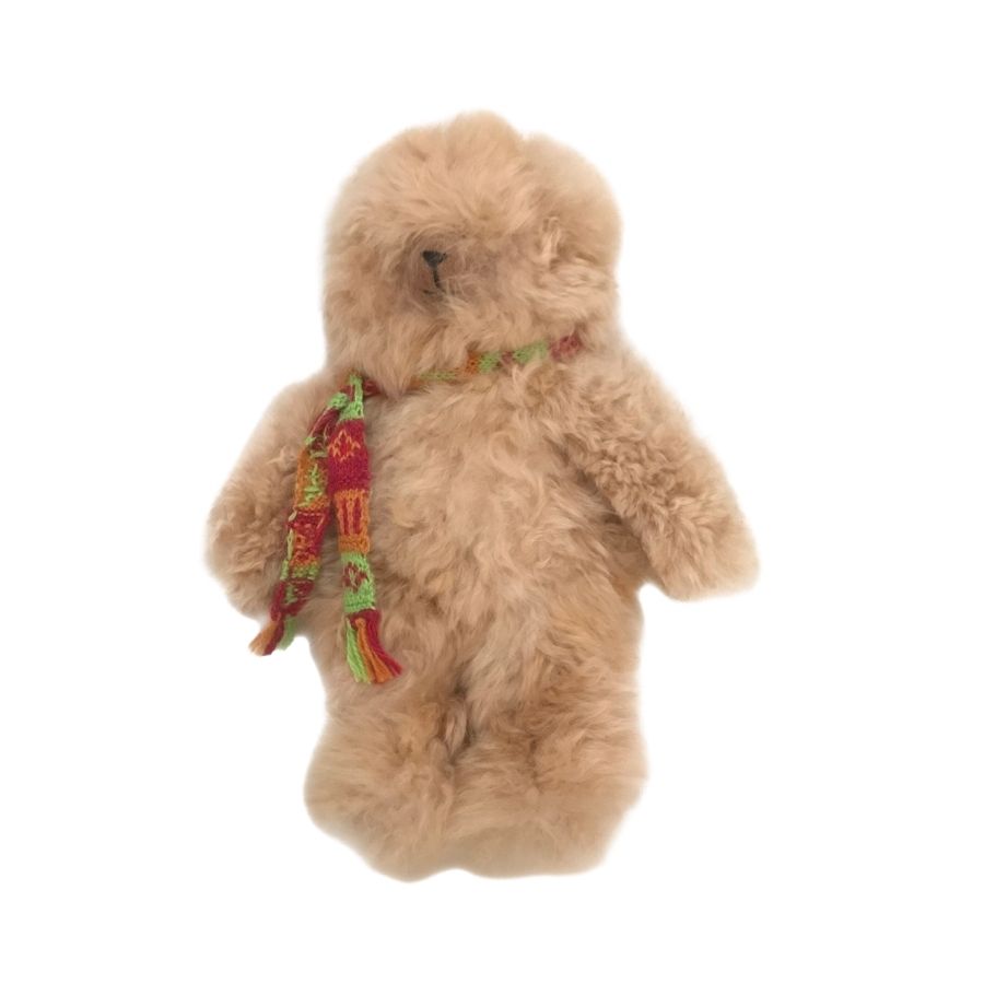 A product photo with a white background of an Alpacas of Montana soft fluffy cozy cute adorable toy silky tan light brown fawn color luxury royal alpaca teddy bear plushie figurine for gifts birthdays christmas children present
