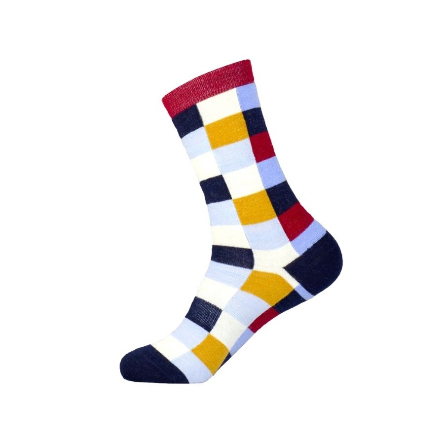 A product photo with a white background of a pair of Alpacas of Montana white, red, orange, navy blue, light blue, and sky blue checkered pattern casual lounge fashion comfortable soft cozy everyday moisture wicking alpaca wool Own It socks.