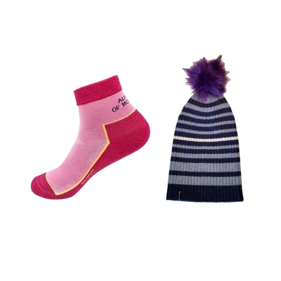 pink alpaca wool quarter socks and blue striped ribbed alpaca wool beartooth beanie with purple pom pom 