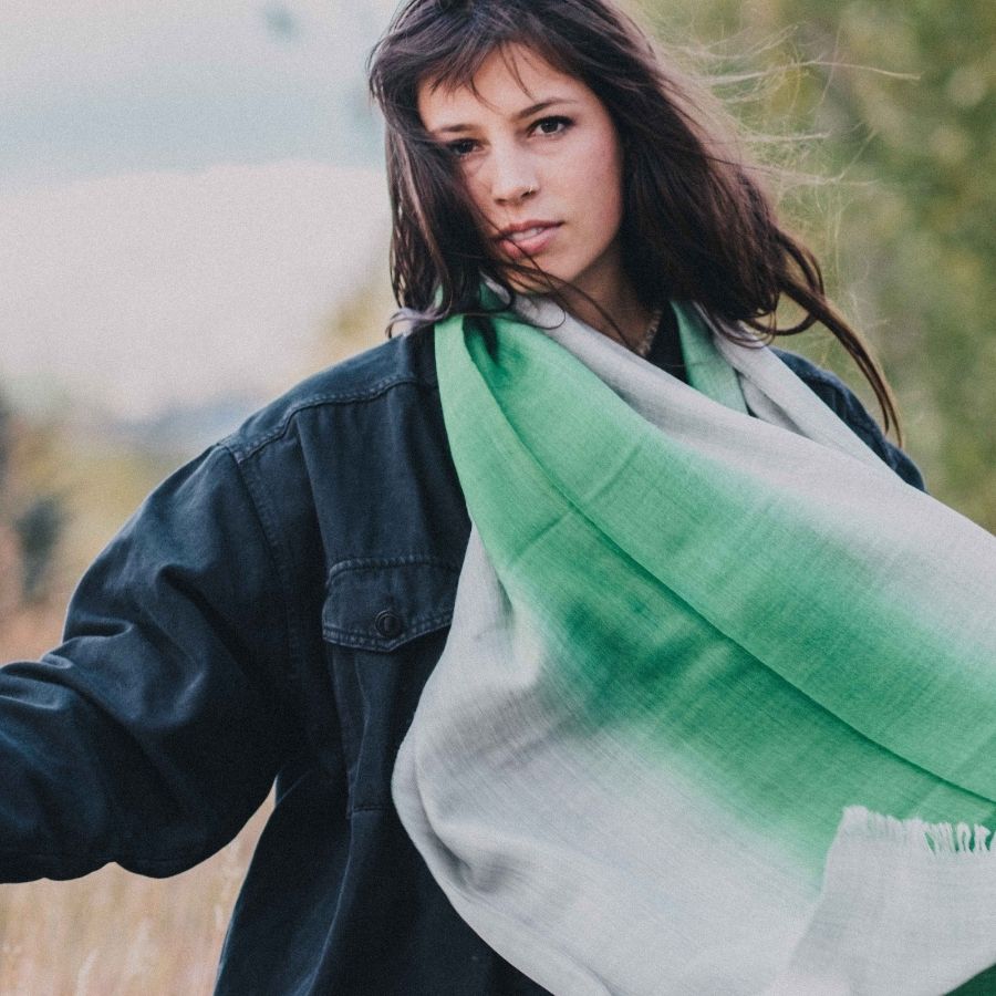 woman wearing gray and green alpaca silk scarf
